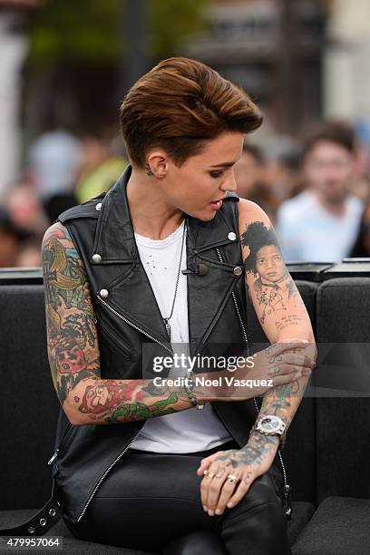 Ruby Rose displays her tattoos at "Extra" at Universal Studios Hollywood on July 8, 2015 in Universal City, California.