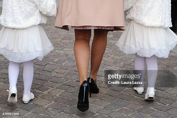 Guests arrive at Sanctuary of Madonna di Montenero before the wedding of Italian singer Andrea Bocelli with Veronica Berti on March 21, 2014 in...