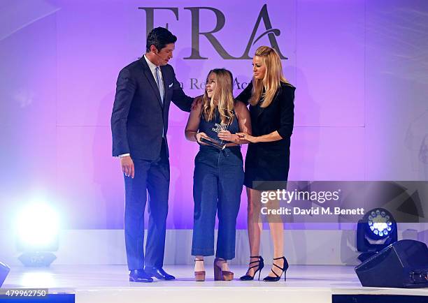 Vernon Kay, Commitment Award winner Callie Walters and Tess Daly attend the Fashion Retail Academy 10th Anniversary Awards at Freemasons' Hall on...