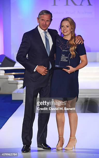 Marc Bolland and Marks and Spencer Award winner Katie Hyde attend the Fashion Retail Academy 10th Anniversary Awards at Freemasons' Hall on July 8,...