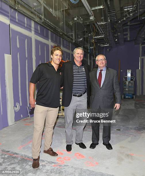 New York Islanders forward Andres Lee, Garth Snow the general manager of the Islanders and Steve Rosebrook the general manager for the Barclays...