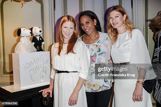 Johanna Ku?hl, Barbara Becker and Alexandra Fischer-Roehler attend the Snoopy & Belle Vernissage at Mercedes-Benz Fashion Week Berlin Spring/Summer...