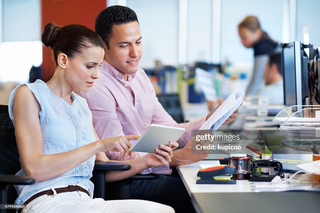 Comparing Paperwork Comparing Digital And Analog Paperwork High-Res Stock Photo - Getty Images