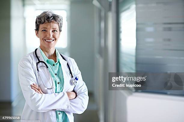 being a doctor was my calling - female doctor portrait stock pictures, royalty-free photos & images