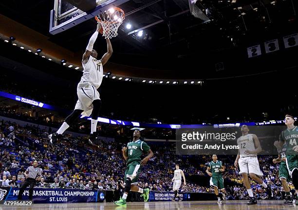 Cleanthony Early of the Wichita State Shockers dunks against the Cal Poly Mustangs during the second round of the 2014 NCAA Men's Basketball...