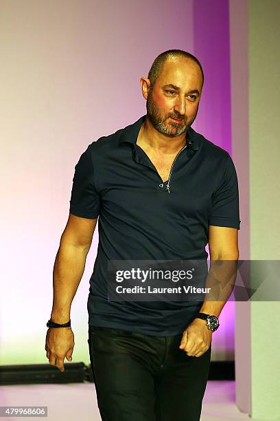 Designer Dany Atrache walks the runway during the Danny Atrache show as part of Paris Fashion Week Haute Couture Fall/Winter 2015/2016 on July 8,...