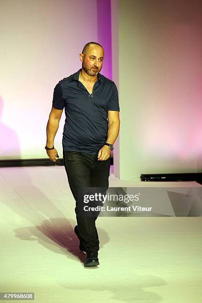 Designer Dany Atrache walks the runway during the Danny Atrache show as part of Paris Fashion Week Haute Couture Fall/Winter 2015/2016 on July 8,...