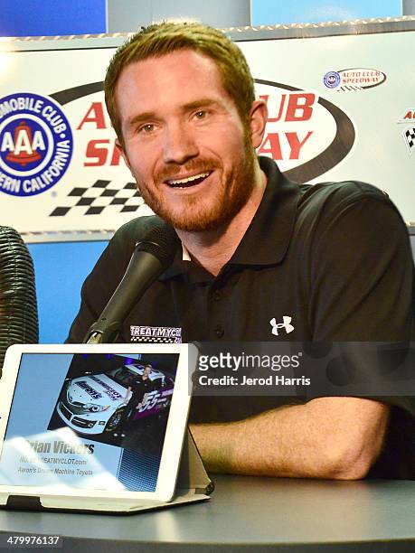 Brian Vickers, driver of the No. 55 TREATMYCLOT.com Aaron's Dream Machine Toyota, participating in a press conference to announce that Janssen...