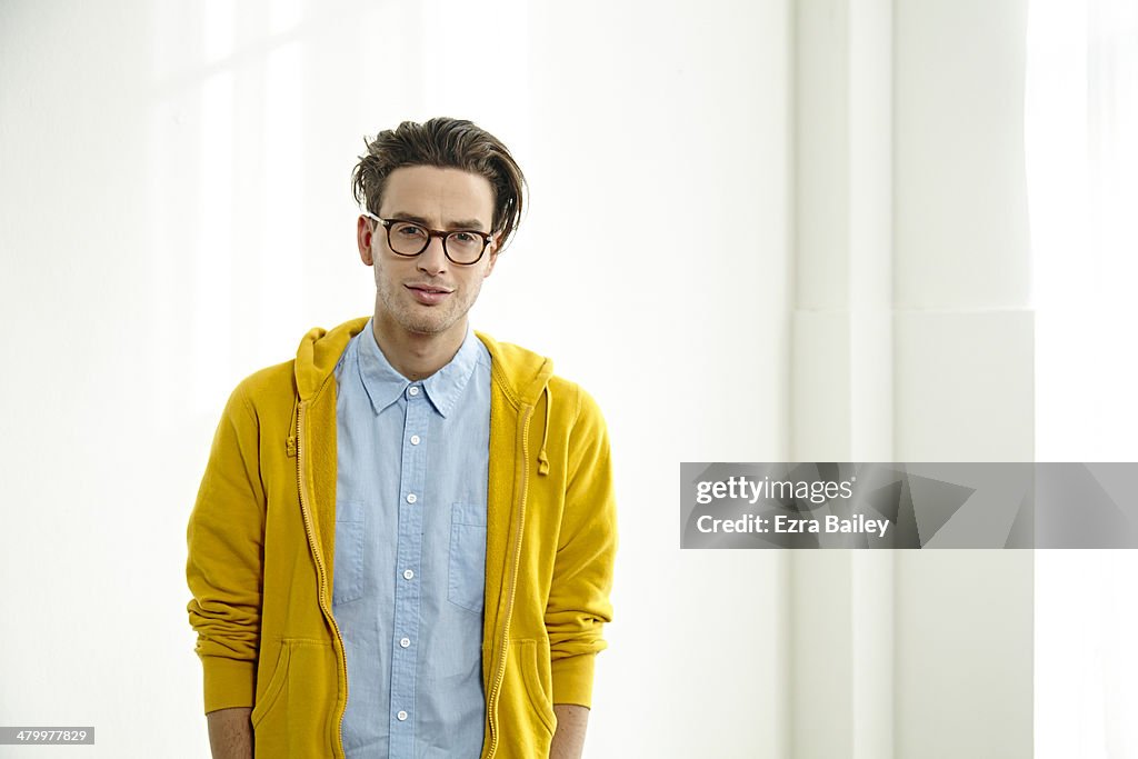 Portrait of a young creative wearing glasses