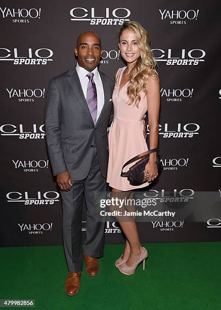 Tiki Barber and Traci Lynn Johnson attend the 2015 CLIO Sports Awards at Cipriani 42nd Street on July 8, 2015 in New York City.