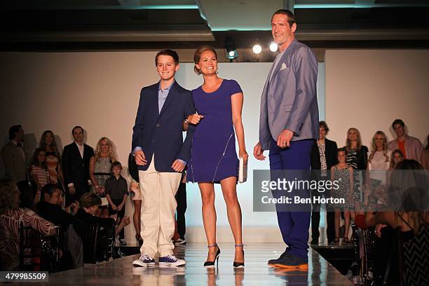 Tommy Lang, Kelly Jackman, and hockey player Tim Jackman attend the Anaheim Lady Ducks Fashion Show Luncheon with Bloomingdale's South Coast Plaza at...