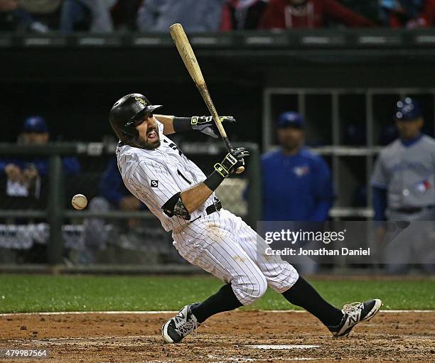 Adam Eaton of the Chicago White Sox is hit by a pitch in the 5th inning at U.S. Cellular Field on July 8, 2015 in Chicago, Illinois.