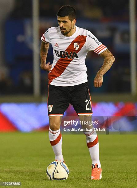 Luis Gonzalez of River Plate drives the ball during a match between Tigre and River Plate as part of 13th round of Torneo Primera Division 2015 at...