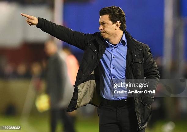 Marcelo Gallardo head coach of River Plate gives instructions to his players during a match between Tigre and River Plate as part of 13th round of...