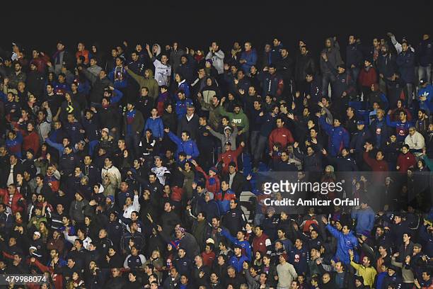 Fans of Tigre cheer for their team during a match between Tigre and River Plate as part of 13th round of Torneo Primera Division 2015 at Jose...