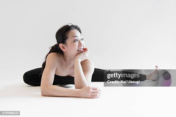 a portrait of yoga woman. - leaning on elbows stock pictures, royalty-free photos & images