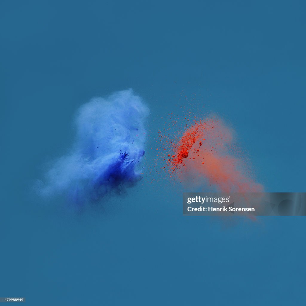 Explosion of colored powder, blue and red