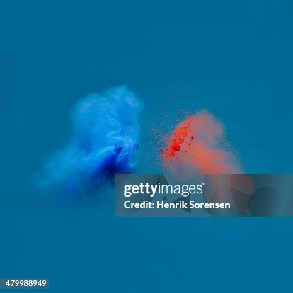 Exploding Powder Red Blue Explosion Of Colored Powder Blue And Red High-Res Stock Photo - Getty ...
