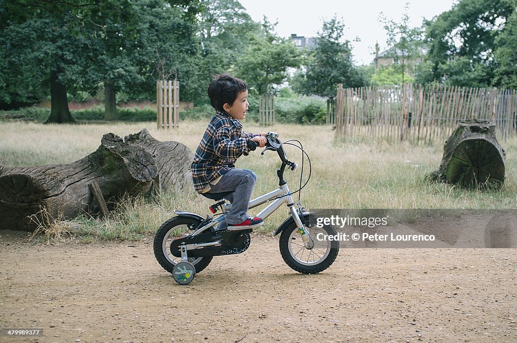 Riding his bike