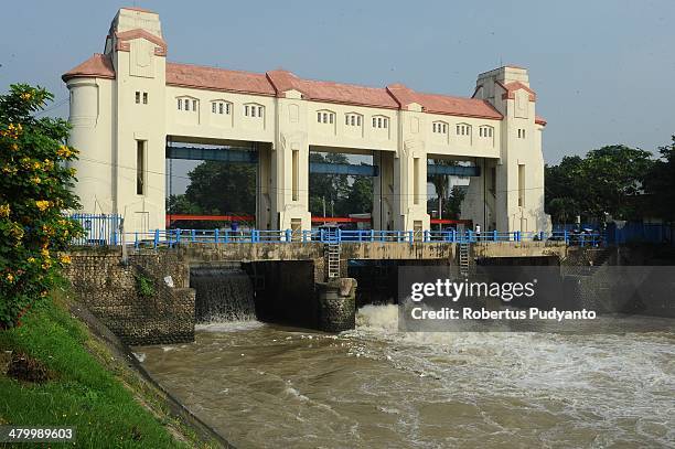 Polluted water seen overflow from the floodgates on World Water Day March 22, 2014 in Surabaya, Indonesia. World Water Day recognizes the global need...