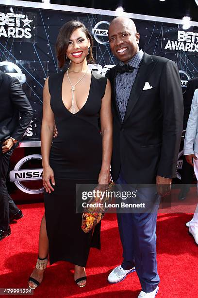 Gwendolyn Osborne and Ex NBA player Kenny Smith arrived at the BET & Make A Wish Foundation Recipients BET Experience At LA. Live Red Carpet arrivals...