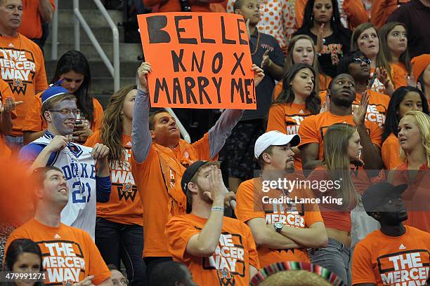 Fan of the Mercer Bears holds up a sign that reads 'BELLE KNOX MARRY ME' during a game against the Duke Blue Devils during the Second Round of the...