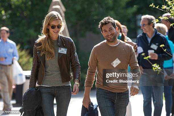 Jonathan "Jon" Oringer, founder and chief executive officer of Shutterstock Inc., right, and Talia Greismann, senior product designer at Rent the...