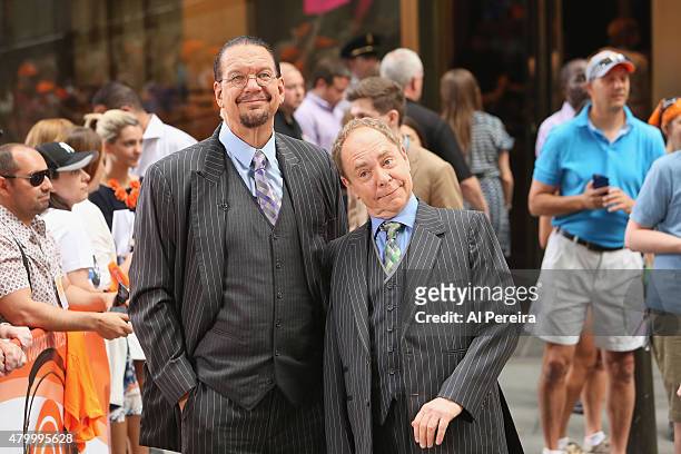 Penn & Teller check out Culture Club when they perform on NBC's "Today Show" at Rockefeller Plaza on July 2, 2015 in New York City.