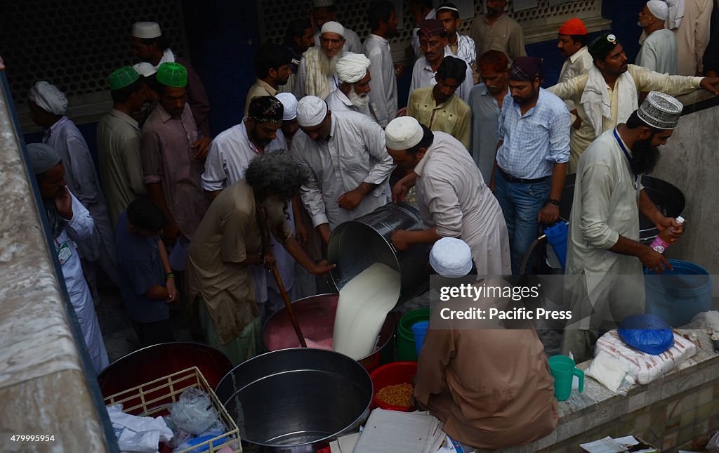 Pakistani Faithful Muslims at Data Darbar and Badshahi...