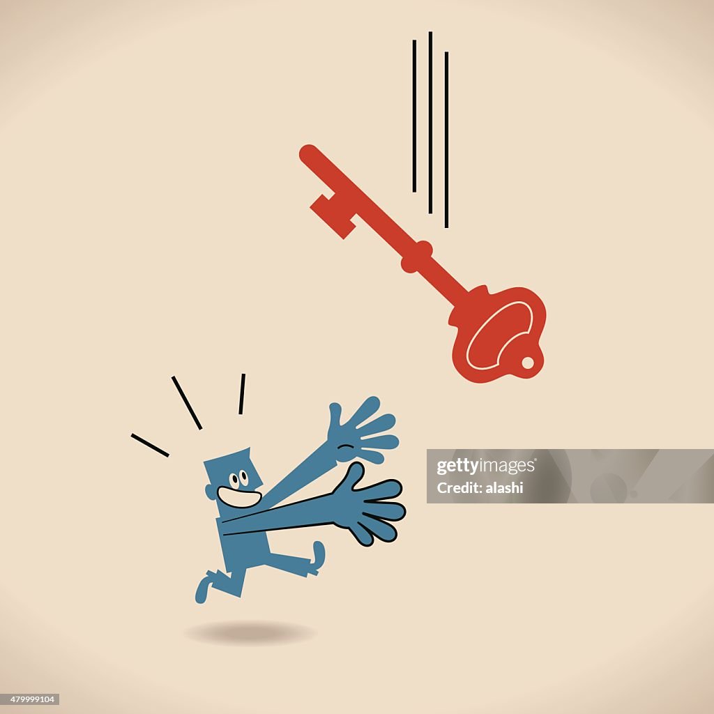 Man (businessman, hand raised) running and catching falling big key