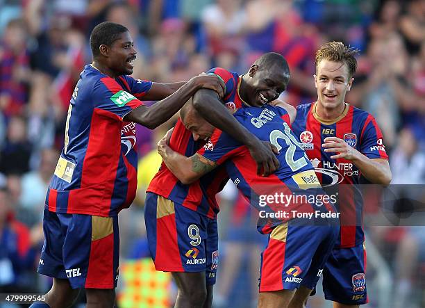 Emile Heskey of the Jets celebrates a goal with team mates during the round 24 A-League match between the Newcastle Jets and Wellington Phoenix at...