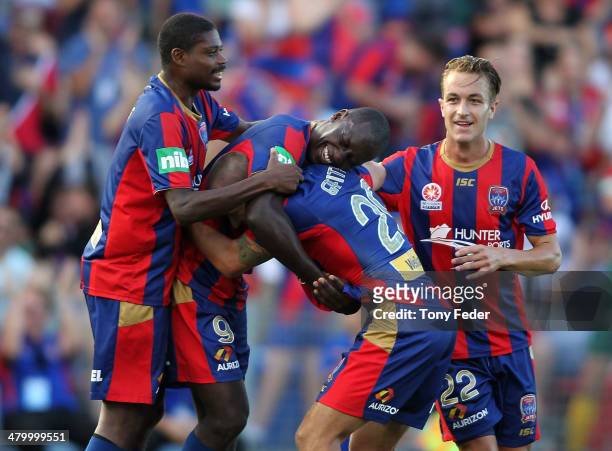 Emile Heskey of the Jets celebrates a goal with team mates during the round 24 A-League match between the Newcastle Jets and Wellington Phoenix at...
