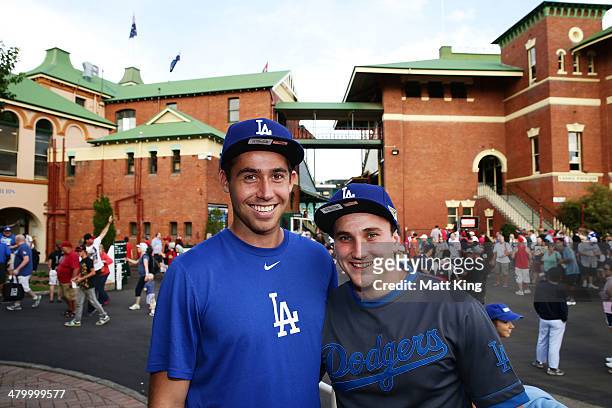 Australian Dodgers fans pose before the opening match of the MLB season between the Los Angeles Dodgers and the Arizona Diamondbacks at Sydney...