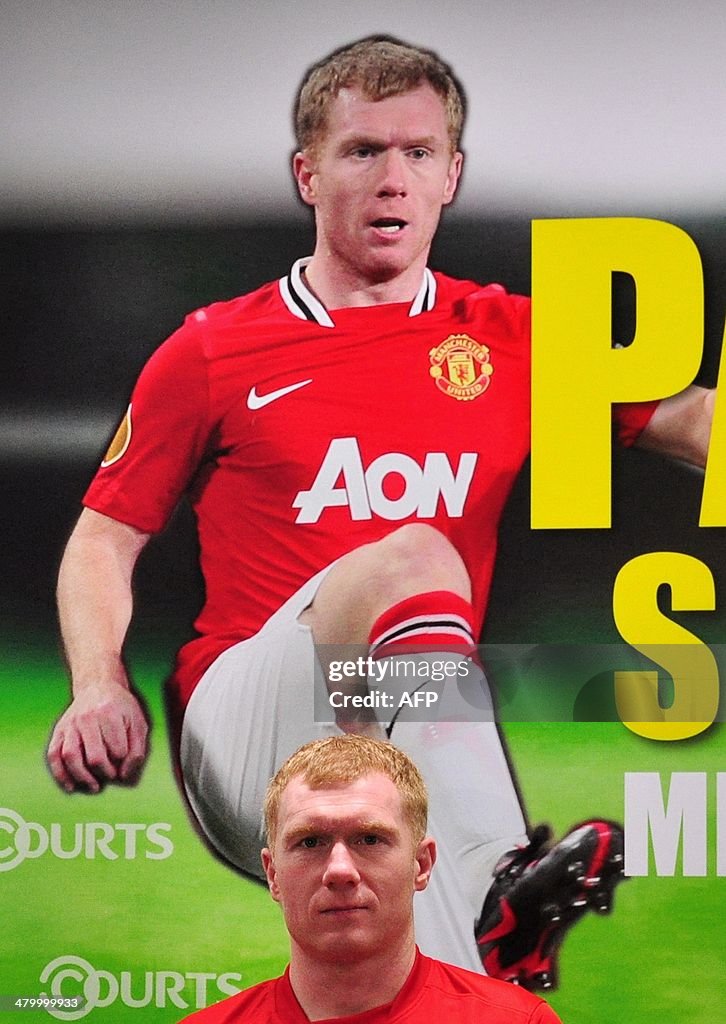 FBL-ASIA-EUR-C1-MANUTD-SCHOLES-SIN