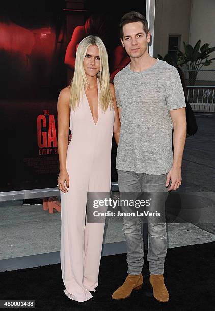 Lauren Scruggs and Jason Kennedy attend the premiere of "The Gallows" at Hollywood High School on July 7, 2015 in Los Angeles, California.