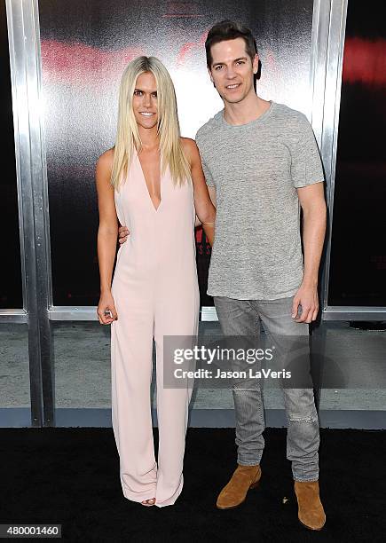 Lauren Scruggs and Jason Kennedy attend the premiere of "The Gallows" at Hollywood High School on July 7, 2015 in Los Angeles, California.