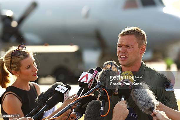 Flying Officer Peter Moore addresses the media after returning from a search mission for possible debris at RAAF base Pearce on March 22, 2014 in...