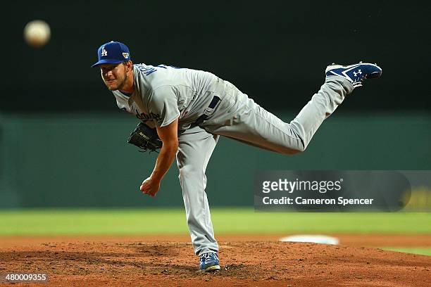 Clayton Kershaw of the Dodgers pitches during the opening match of the MLB season between the Los Angeles Dodgers and the Arizona Diamondbacks at...