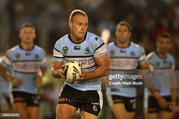 Daniel Holdsworth of the Sharks looks to offload the ball during the round three NRL match between the Cronulla-Sutherland Sharks and the St George...