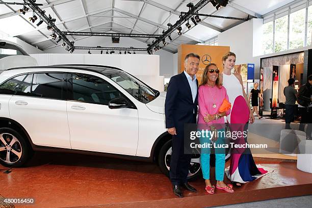 Wolfgang Schattling, Carlyne Cerf de Dudzeele and Doutzen Kroes attend the Mercedes-Benz Press Vernissage during the Mercedes-Benz Fashion Week...