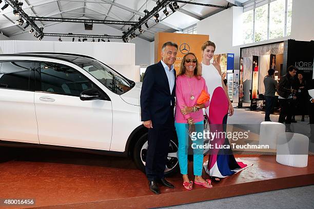 Wolfgang Schattling, Carlyne Cerf de Dudzeele and Doutzen Kroes attend the Mercedes-Benz Press Vernissage during the Mercedes-Benz Fashion Week...