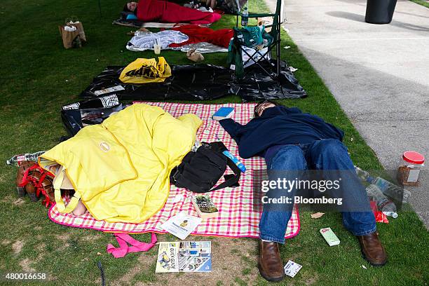 Attendees camp out to gain entry into Hall H before the start of the Comic-Con International convention in San Diego, California, U.S, on Wednesday,...