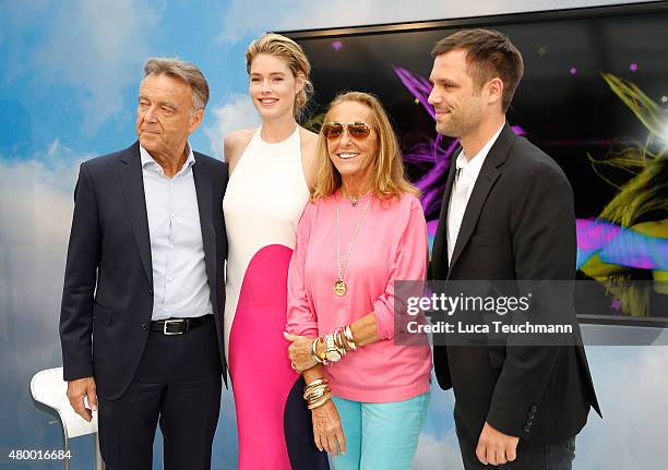 Wolfgang Schattling, Doutzen Kroes, Carlyne Cerf de Dudzeele and Ole Tillmann attend the Mercedes-Benz Press Vernissage presentation during the...