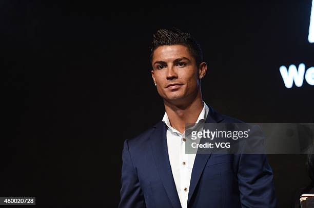 Footballer Christiano Ronaldo of Real Madrid and Portugal, a new spokesman for MTG, attends MTG commercial activity on July 9, 2015 in Shanghai,...