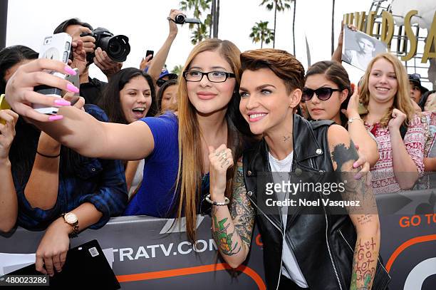 Ruby Rose takes a selfie with fans at "Extra" at Universal Studios Hollywood on July 8, 2015 in Universal City, California.