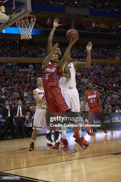 Playoffs: Dayton Devin Oliver in action vs Ohio State at First Niagra Center. Buffalo, NY 3/20/2014 CREDIT: Damian Strohmeyer