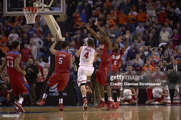 Playoffs: Rear view of Ohio State Aaron Craft in action vs Dayton at First Niagra Center. Buffalo, NY 3/20/2014 CREDIT: Damian Strohmeyer