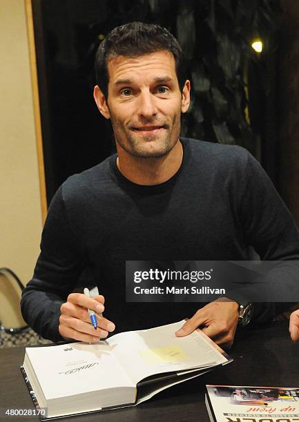 Former Australian Formula One driver Mark Webber signs his autobiography "Aussie Grit" at Sofitel Hotel on July 9, 2015 in Sydney, Australia. Webber,...