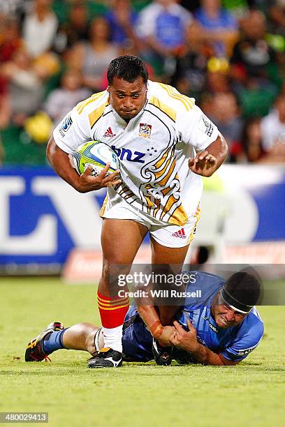 Pauliasi Manu of the Chiefs is tackled by Brynard Stander of the Force during the round six Super Rugby match between the Force and the Chiefs at nib...