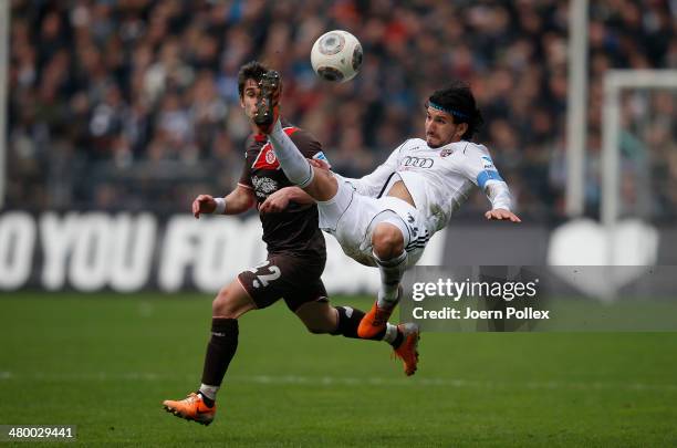 Fin Bartels of Hamburg and Almoq Cohen of Ingolstadt compete for the ball during the Second Bundesliga match between FC St. Pauli and FC Ingolstadt...